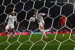 Italian defender Riccardo Calafiori (centre) hits the ball into his own net for the only goal of the game, an own goal during the match between Spain and Italy in Gelsenkirchen, Germany, June 20, 2024.