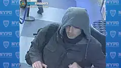 A New York City Police Department (NYPD) handout image of an individual wanted for questioning in connection with the killing of UnitedHeatlhcare CEO Brian Thompson.