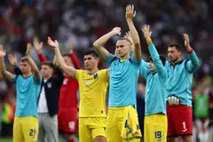 Ukrainian players thank their supporters after their 0-0 draw against Belgium in Stuttgart, Germany, June 26, 2024.  Ukraine finished bottom of their group and failed to progress to the second round.