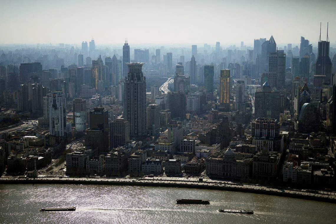 A view of the city skyline and Huangpu River in Shanghai. As China moves forward, its growth needs to come from the service sector and through more efficient resource allocation.
