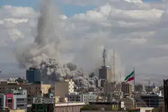Smoke rises after coordinated US and Israeli airstrikes in Teheran, Iran, March 1, 2026.