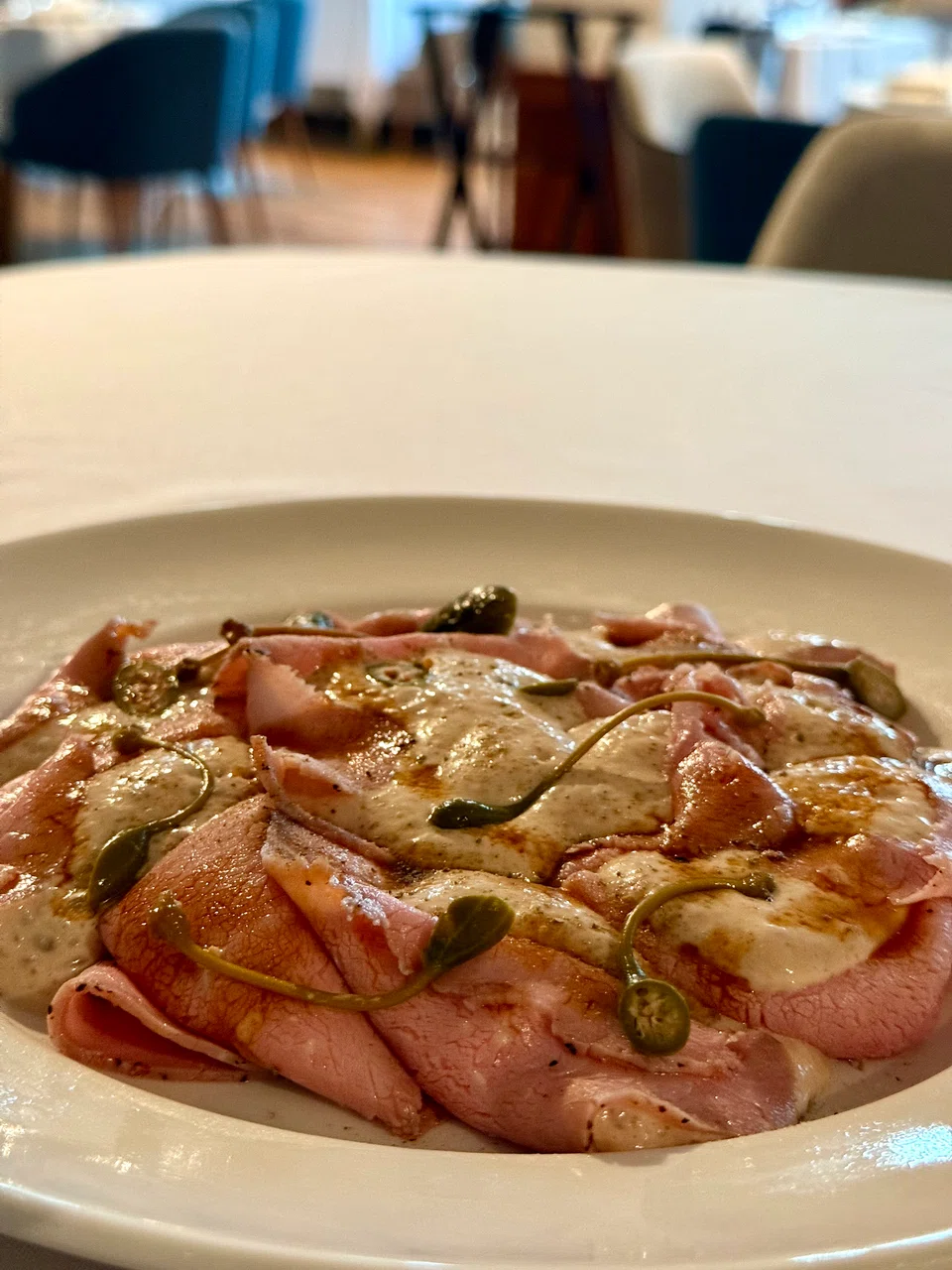 Vitello tonnato features slices of veal in tuna sauce.