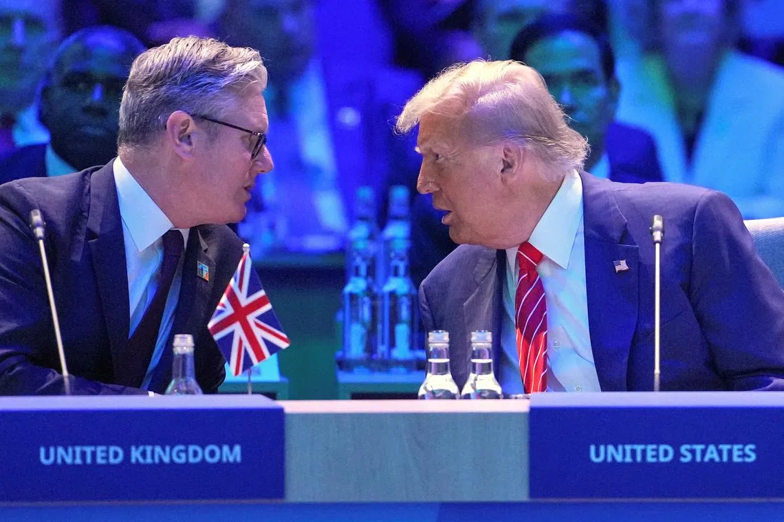 US President Donald Trump speaking to Britain's Prime Minister Keir Starmer at a Nato summit in June. Starmer will hope to seize opportunities in the bilateral relationship while managing the risks posed by Trump's notable volatility. 