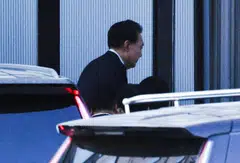 South Korea's impeached President Yoon Suk-yeol arrives at the Corruption Investigation Office for High-ranking Officials, in Gwacheon, South Korea. 