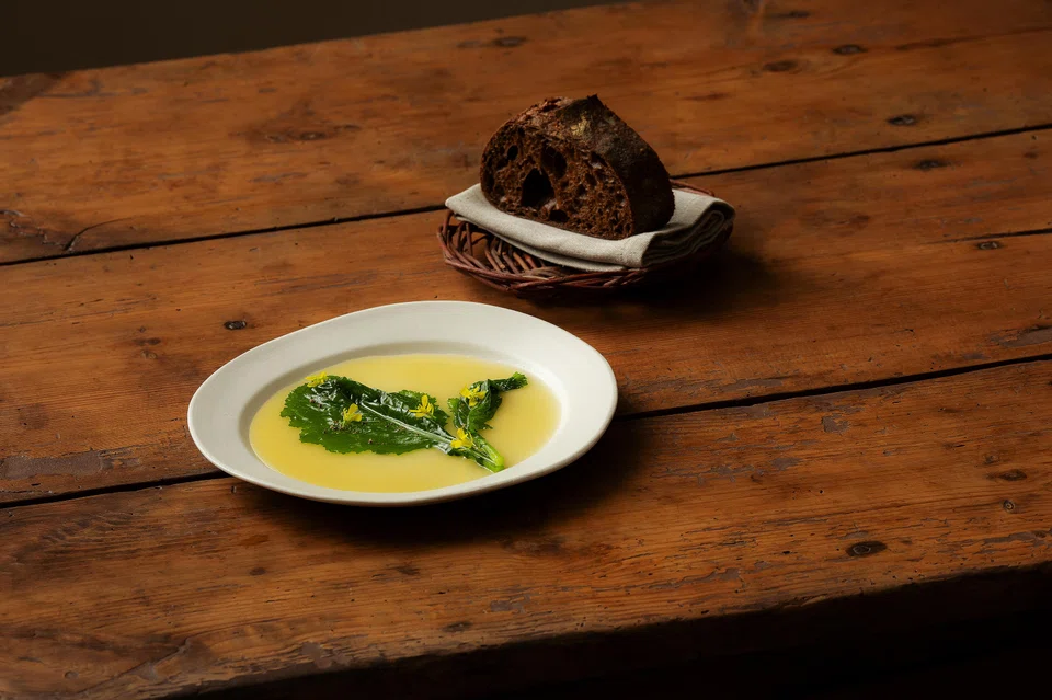Roasted wheat and carob sourdough with olive oil emulsion.