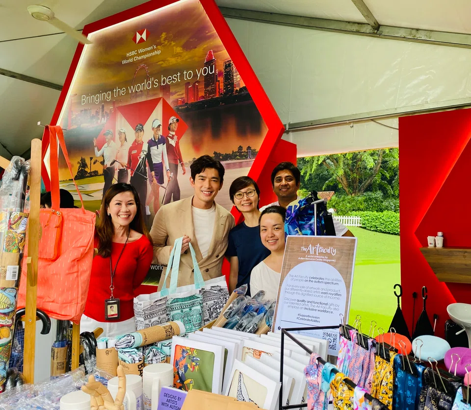 Visitors at the Art Faculty pop-up booth at the HSBC Women'ss World Championship's tournament fan village at Sentosa Golf Club.