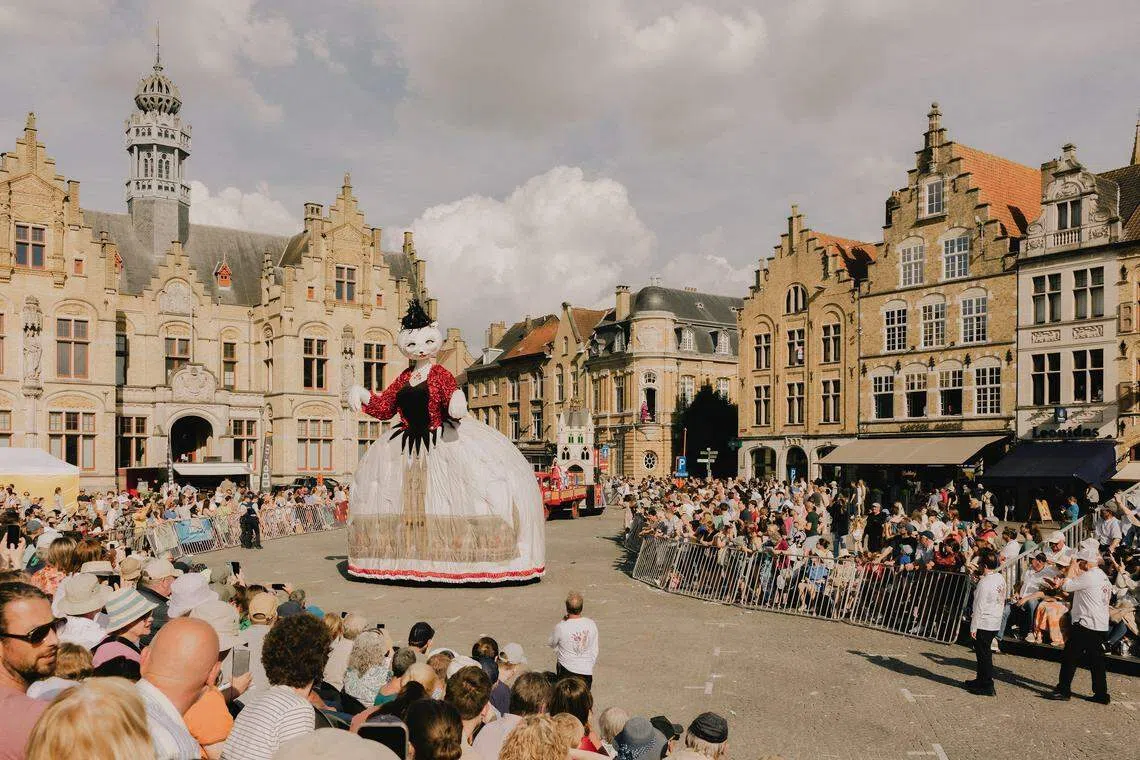 The float of Minneke Poes, the feline wife of the King of Cats, Cieper, at Kattenstoet, a cat-themed parade and festival in Iepers, Belgium.