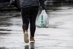 Dollar General says that some of its customers are under so much financial strain that they are pulling back on essential items, while higher-income consumers are shifting to shopping at discount chains. 