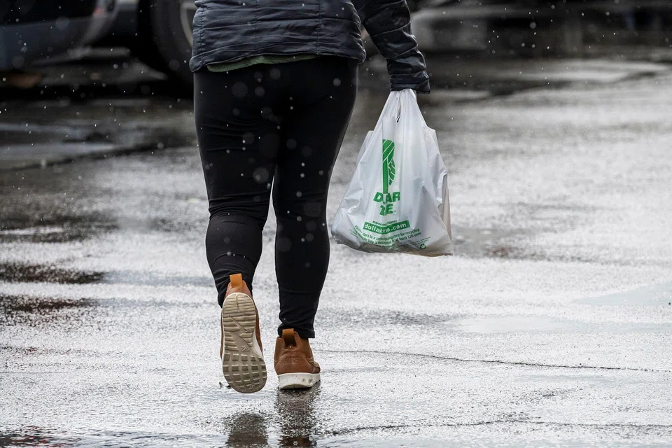 Dollar General says that some of its customers are under so much financial strain that they are pulling back on essential items, while higher-income consumers are shifting to shopping at discount chains. 