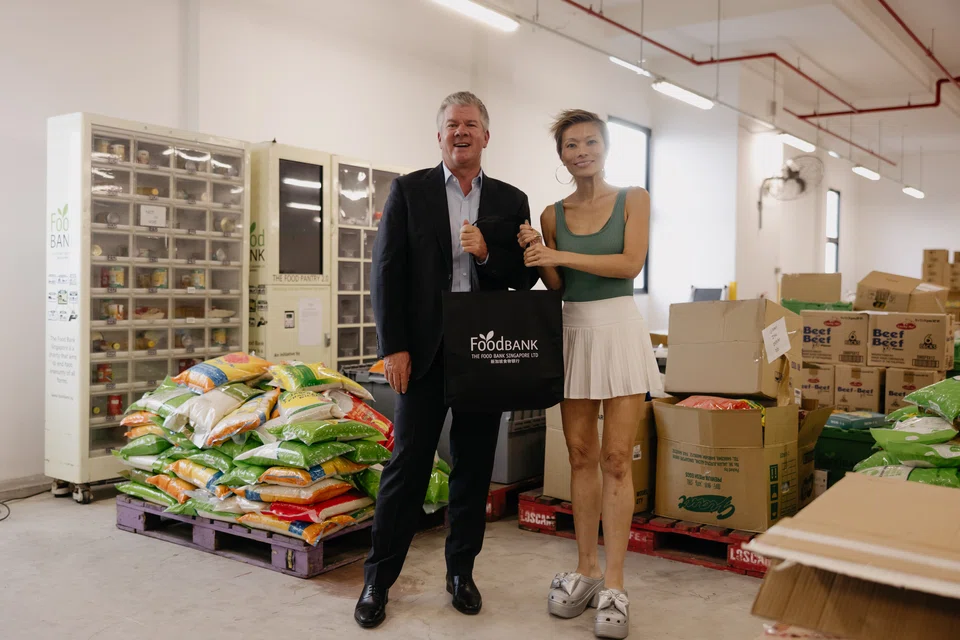 Ron Reese (left), senior vice-president of global communications and corporate affairs at Las Vegas Sands, and one of Food Bank Singapore's co-founders Nichol Ng.
