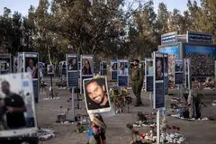 An Israeli army soldier walks past the memorials of victims of the Oct 7, 2023 attacks at the Nova Festival grounds in Reim in southern Israel on Oct 6, 2025, a day before the attacks' second anniversary. Hamas' October 2023 attack resulted in the deaths of 1,219 people, mostly civilians, according to an AFP tally of Israeli official figures. 