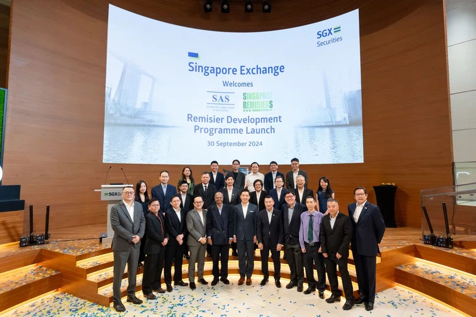 Securities industry representatives at the launch ceremony of the Remisier Development Programme, held at the SGX Centre on Monday (Sep 30). 