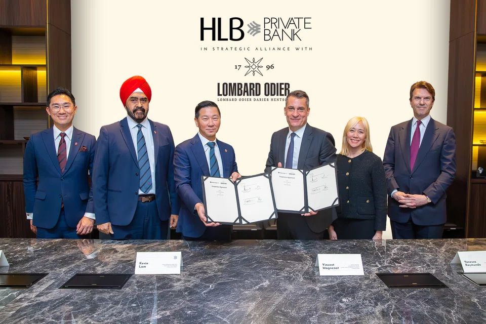 From left: HLB's Jeffrey Yap, managing director and head of regional wealth management; Malkit Singh Maan, chief financial officer; Kevin Lam, group managing director and CEO; Lombard Odier's Vincent Magnenat, Asia group regional head and global head of strategic alliances; Vanessa Raymundo, managing director, head of Asia private banking strategic alliances; Hubert Keller, senior managing partner, at the signing of the strategic alliance between the two banks. 