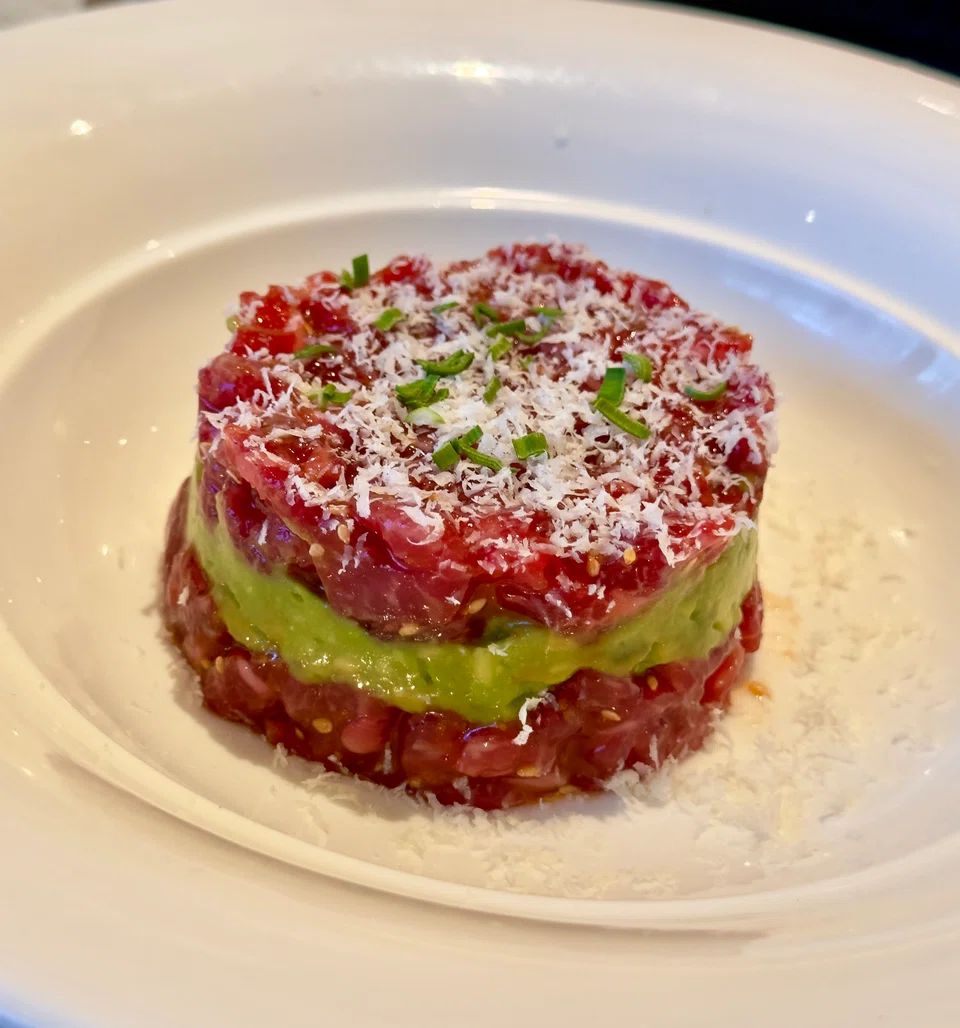 Chopped raw beef is layered with avocado for a mild-tasting yukhoe.