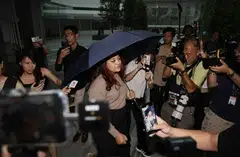 Former WP member Raeesah Khan arriving at the State Courts on Oct 14. ST PHOTO: KELVIN CHNG