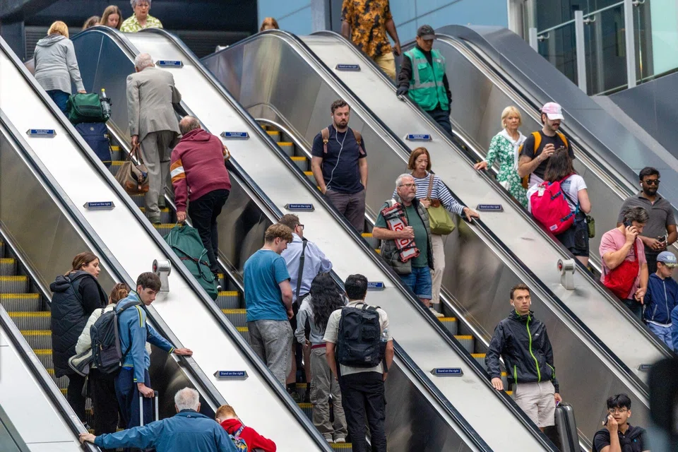 Train passengers at Reading railway station. The Elizabeth line has rapidly become the busiest train line in the country.