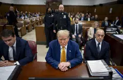 Former US President Donald Trump awaits the start of proceedings in his criminal trial at the New York State Supreme Court in New York, May 2, 2024. 