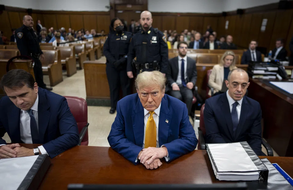 Former US President Donald Trump awaits the start of proceedings in his criminal trial at the New York State Supreme Court in New York, May 2, 2024. 