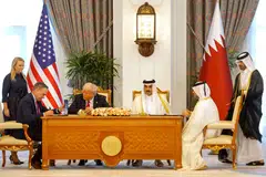 Qatar's Emir Sheikh Tamim bin Hamad al-Thani (centre right) and US President Donald Trump (centre left) watch as Boeing CEO Kelly Ortberg (left) and Qatar Airways CEO Badr Mohammed al-Meer (right) sign documents during a signing ceremony at the Royal Palace in Doha on May 14.
