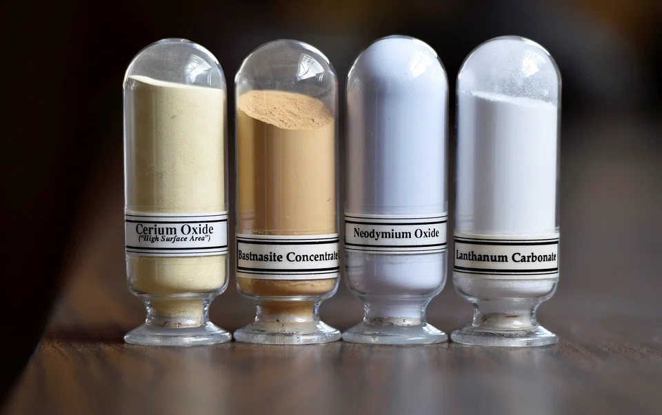 FILE PHOTO: Samples of rare earth minerals from left, Cerium oxide, Bastnasite, Neodymium oxide and Lanthanum carbonate are on display during a tour of Molycorp's Mountain Pass Rare Earth facility in Mountain Pass, California June 29, 2015.  REUTERS/David Becker -/File Photo