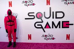 A pink soldier guard at a 'Squid Game' event in California on June 12, 2022. The South Korean smash hit is tipped to be the first non-English-language drama series to be nominated at this year's Emmy Awards.