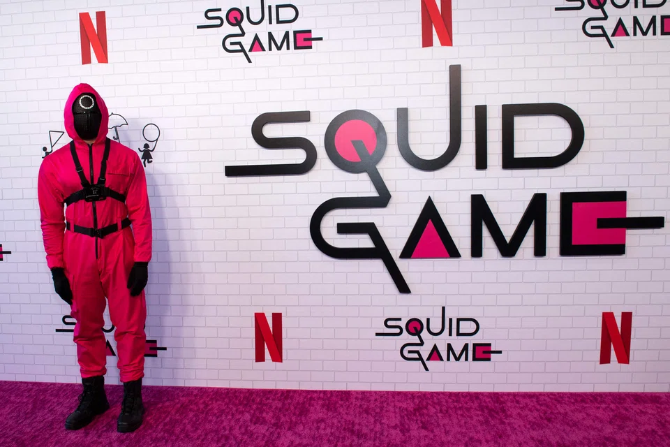 A pink soldier guard at a 'Squid Game' event in California on June 12, 2022. The South Korean smash hit is tipped to be the first non-English-language drama series to be nominated at this year's Emmy Awards.