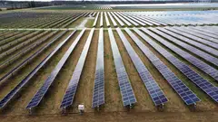 Solar panels on Dave Duttlinger's farmland that is leased to Dunns Bridge Solar LLC in Wheatfield, Indiana, US, April 5, 2024.  