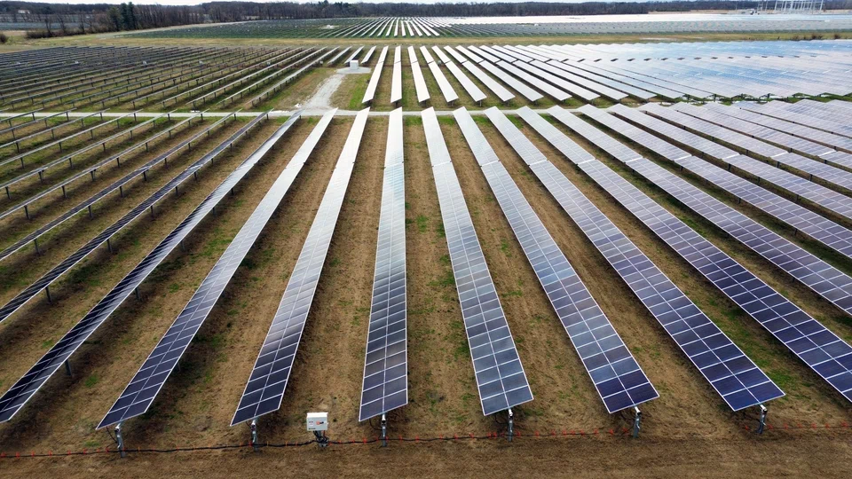Solar panels on Dave Duttlinger's farmland that is leased to Dunns Bridge Solar LLC in Wheatfield, Indiana, US, April 5, 2024.  