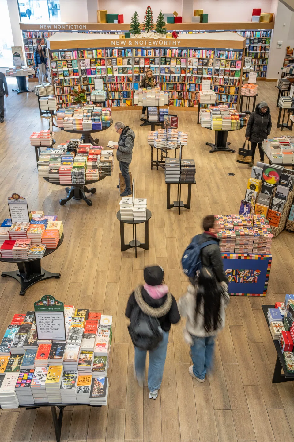 Customers browsing at Barns & Noble in New York. While sales are solid and bookstores are generally flourishing, the book business still faces a dizzying set of challenges. 