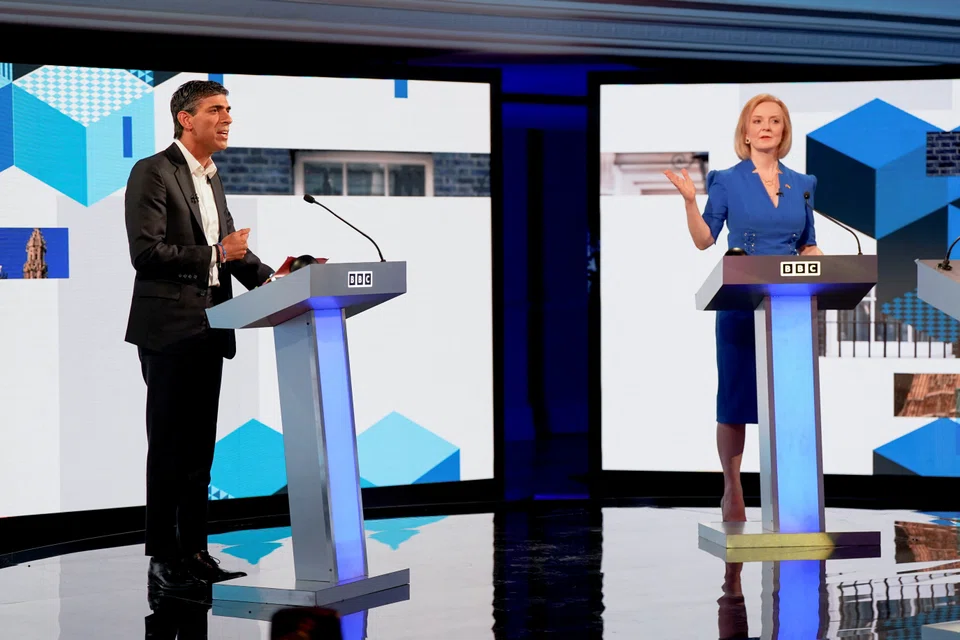 Rishi Sunak and Liz Truss take part in the BBC Conservative party leadership debate at Victoria Hall in Hanley, Stoke-on-Trent, Britain, July 25, 2022. 