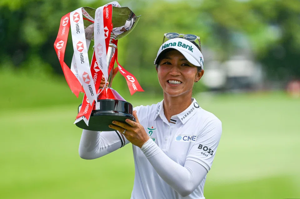 Lydia Ko of New Zealand with the trophy after winning the HSBC Women's World Championship at Sentosa Golf Club on Sunday.