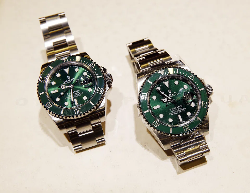 The real Rolex Submariner (right) compared to a  counterfeit (left).