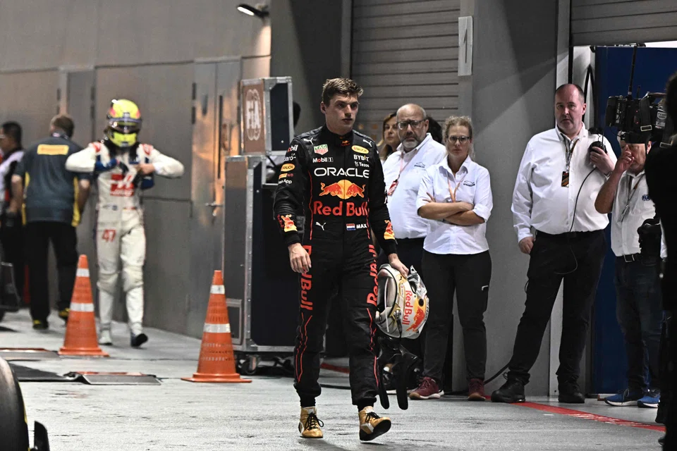 Red Bull Racing's Dutch driver Max Verstappen leaves after the Formula One Singapore Grand Prix night race at the Marina Bay Street Circuit in Singapore on Oct 2, 2022. 