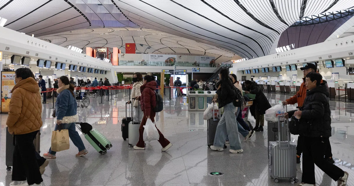 China broadens travel curbs to encompass family of top AI talent - The Business Times