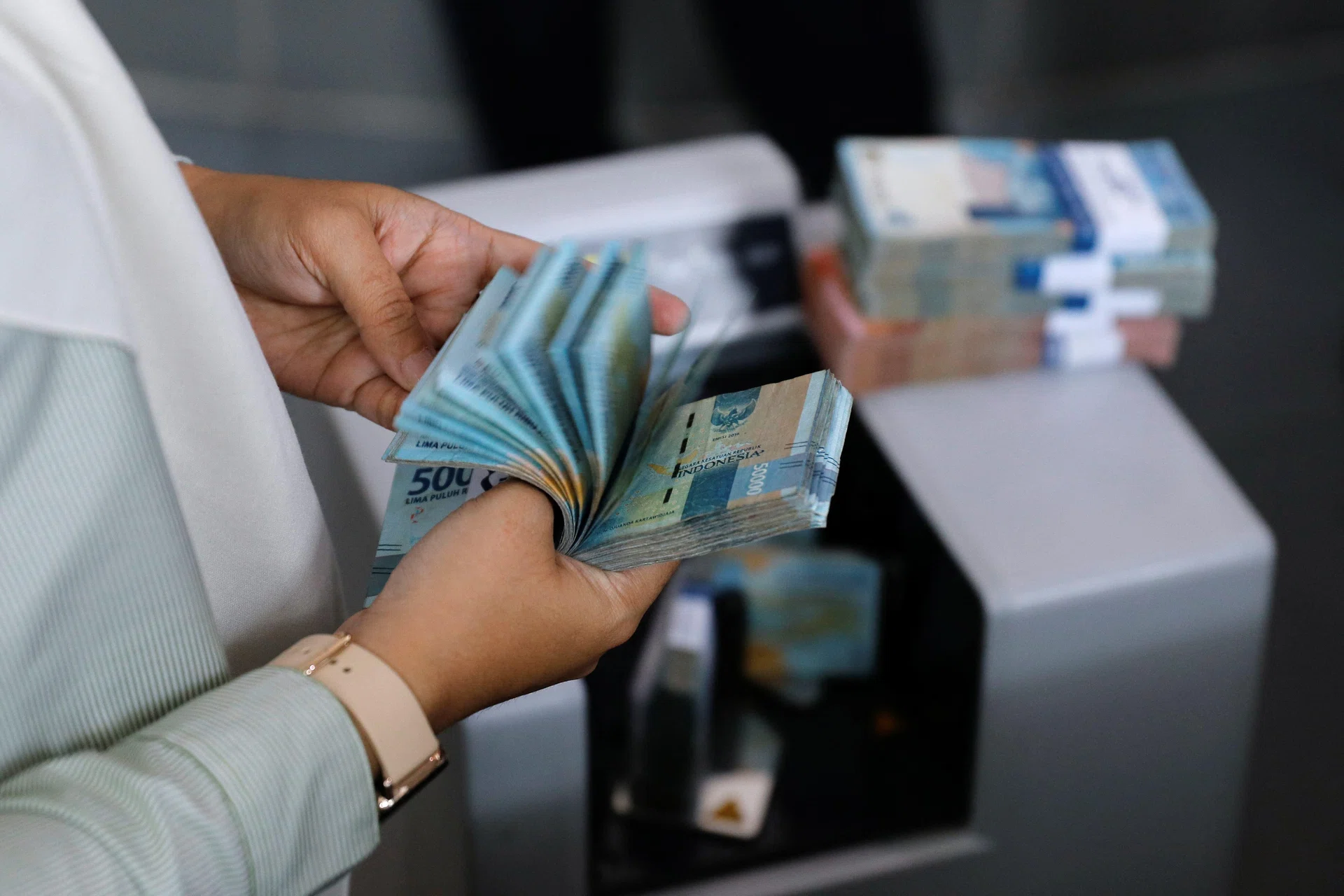 Indonesia intervenes in markets as rupiah sets new record low
