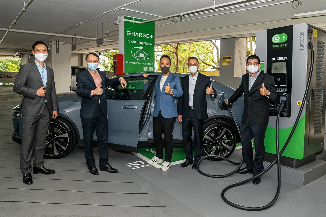 Singapore CBD's largest EV charging hub launched at OCBC Centre