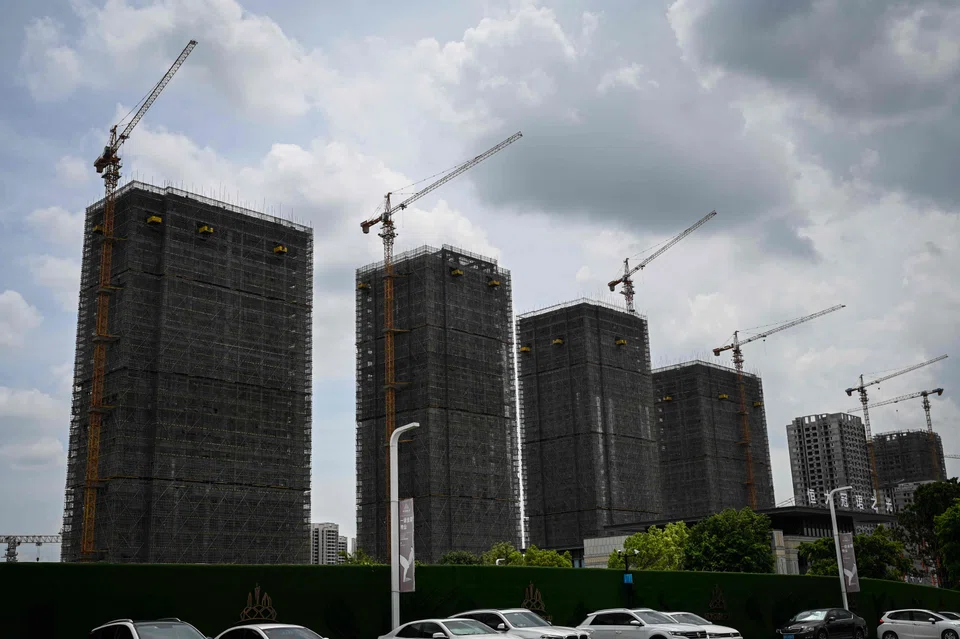Evergrande residential buildings under construction in Guangzhou. China's strict Covid policy has delayed construction and choked cash flows.