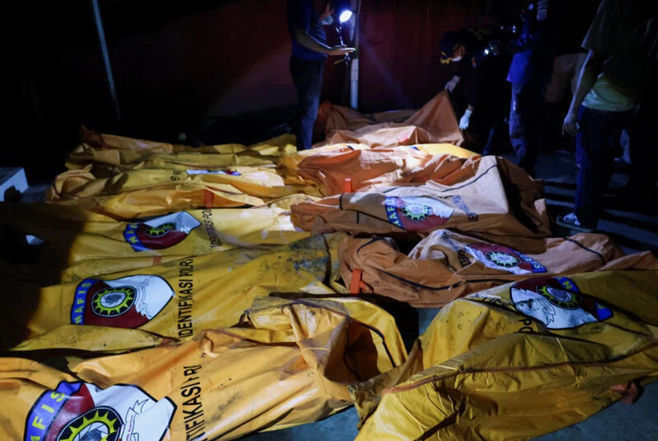 Body bags containing the victims from a fire at Werdha Damai retirement home in Manado, North Sulawesi Province.