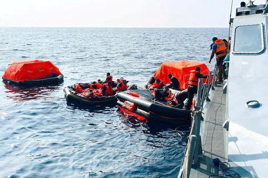Sri Lanka Navy personnel assist Iranian sailors during a rescue operation after responding to a distress call from their vessel, the Iranian military ship, IRIS Dena, while at sea within Sri Lanka’s maritime search and rescue region, in Indian Ocean, Sri Lanka, March 4, 2026. Sri Lanka Navy/Handout via REUTERS    THIS IMAGE HAS BEEN SUPPLIED BY A THIRD PARTY

     TPX IMAGES OF THE DAY     