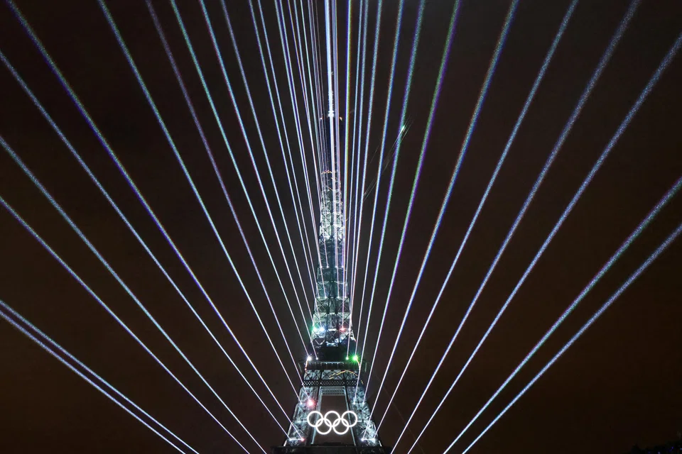 Lights illuminate the Eiffel Tower during the opening ceremony of the Paris 2024 Olympic Games in Paris, France, July 26, 2024.   