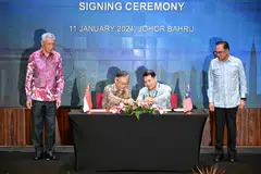 The signing of the Memorandum of Understanding (MOU) on the Johor-Singapore Special Economic Zone (JS-SEZ) on Jan 11, 2024 by Minister for Trade and Industry Gan Kim Yong and Malaysia’s Minister of Economy Mohd Rafizi Ramli, and witnessed by Singapore Prime Minister Lee Hsien Loong and Malaysia Prime Minister Anwar Ibrahim.