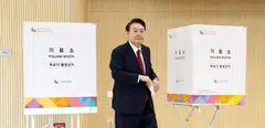 South Korean President Yoon Suk Yeol casts his early vote on Apr 5 for the country's elections. A major poll shows his party has 37 per cent of support.