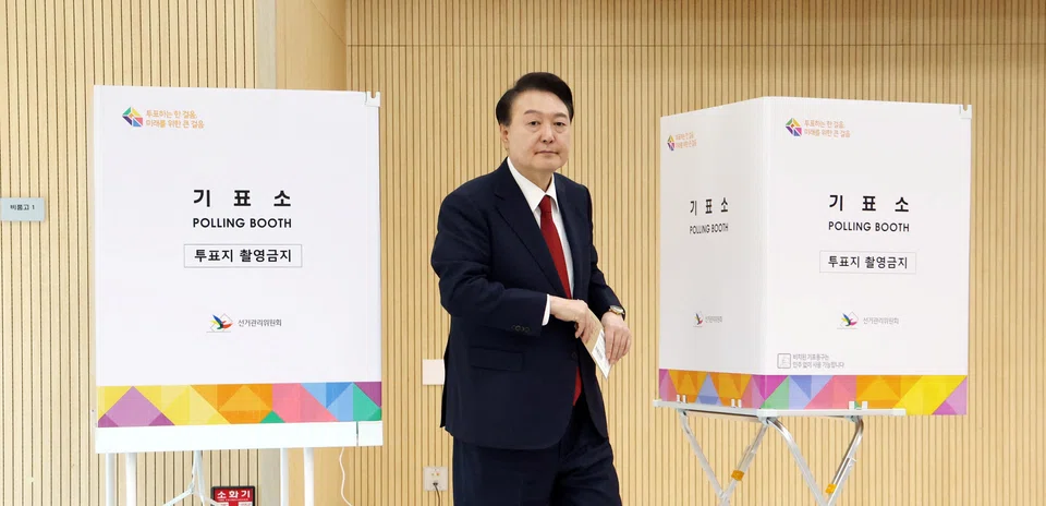 South Korean President Yoon Suk Yeol casts his early vote on Apr 5 for the country's elections. A major poll shows his party has 37 per cent of support.