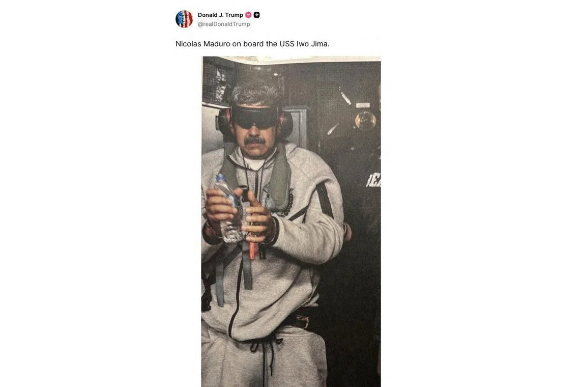 An image posted by President Donald Trump on his Truth Social account shows what he says is President Nicolas Maduro of Venezuela, blindfolded and handcuffed, on board the USS Iwo Jima on Jan. 3.