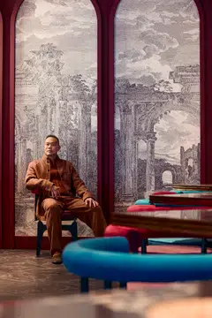 It was only after spending 10 years in the civil service that John Lim got to start his entrepreneurial journey. He wears a tobacco silk and linen Il Conte jacket, tobacco linen Oasi Lino bomber jacket, tobacco silk Oasi Lino one-pleat trousers, and dark brown suede leather moccasins, all from Zegna.