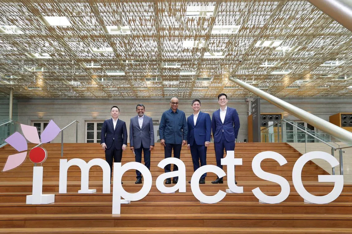 From left: Dr Daniel Lim, director at the Ministry of Trade and Industry and co-founder of ImpactSG; Ravi Menon, board chairman of ImpactSG; President Tharman Shanmugaratnam, who launched the initiative; Edmund Twohill, executive director and co-founder of ImpactSG; and Kwee Ker Fong, principal at Kwee Investment Office and co-founder of ImpactSG.