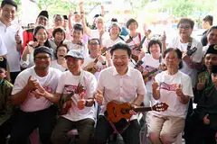 Prime Minister Lawrence Wong, on his first visit to Aljunied GRC since taking over Singapore’s top job, with ukulele players at the community event for seniors in Kovan Hub.