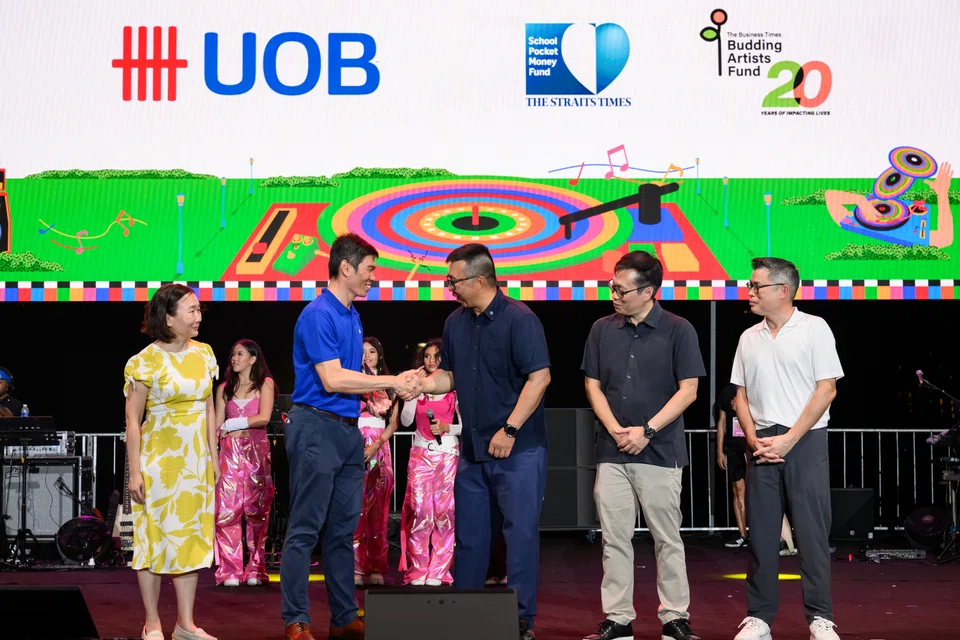 At the festival, SPH Media presented a token of appreciation to UOB for its support of ChildAid, a charity concert organised by The Business Times and The Straits Times. From left: BT editor Chen Huifen; SPH Media deputy CEO Kuek Yu Chuang; UOB head of group corporate social responsibility Leonard Tan; SPH English/Malay/Tamil Media group editor-in-chief Wong Wei Kong; and ST editor Jaime Ho.