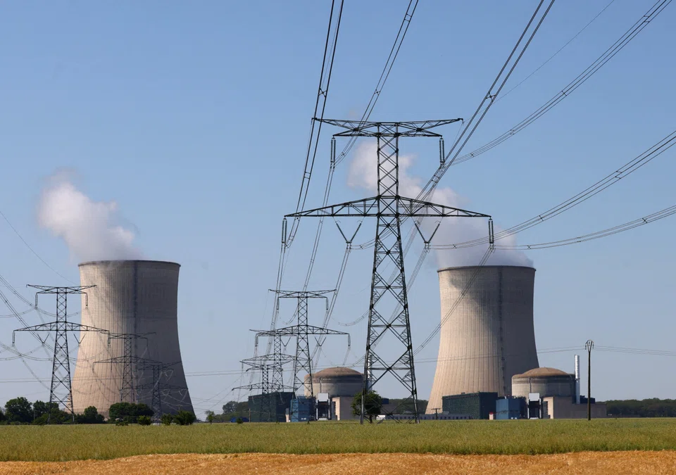 The cooling towers and reactors of a nuclear power plant in France. While older versions of conventional nuclear reactors are unfeasible in Singapore, small modular reactors and Generation IV thermal reactors "could potentially suit our needs", Dr Tan says.