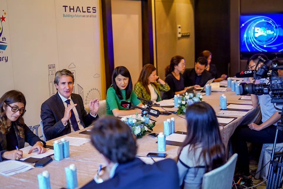 Thales Group chairman and CEO Patrice Caine (second from left) and country director Emily Tan (third from left) meeting reporters on Wednesday (Oct 5).